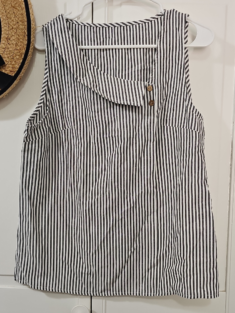 Black & White Striped Button-Detail Sleeveless Blouse.